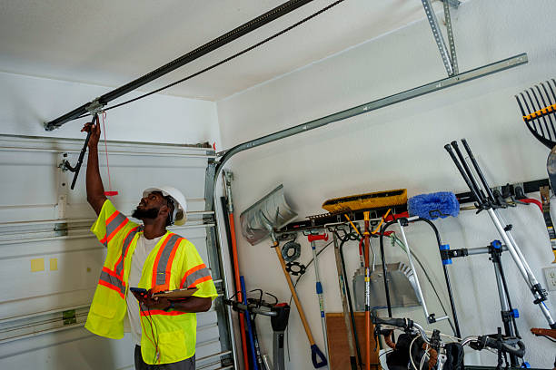 Professional Garage Door Roller Replacement technician working in Ames, IA